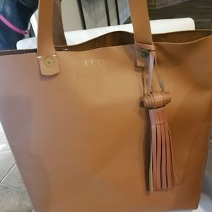 FEED project Harriet Tote with leather tassel.